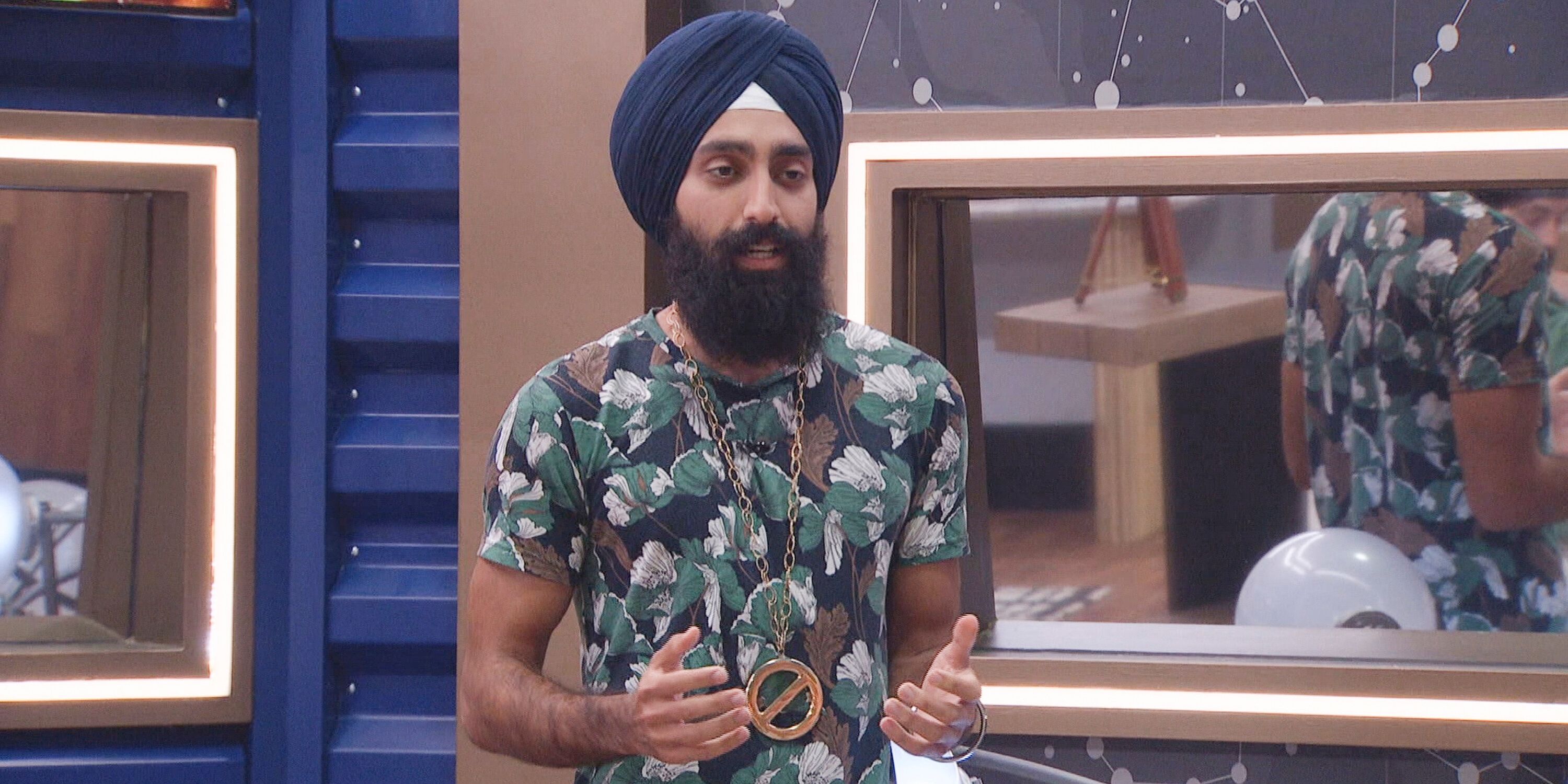 Jag Bains wears the veto necklace in the 'Big Brother 25' living room
