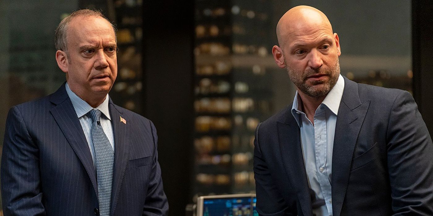 Chuck and Mike from Billions standing next to one another, both looking angry.