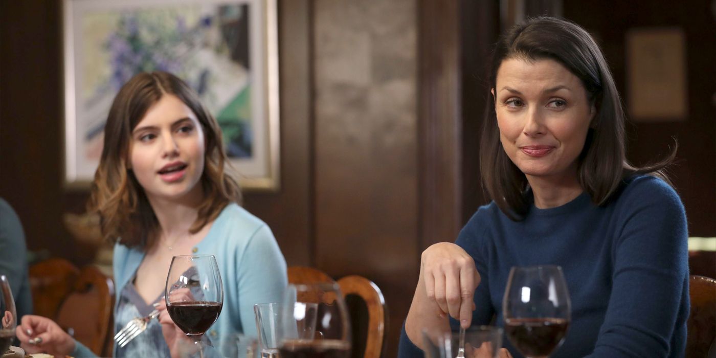 Erin Reagan eats dinner with her daughter in a scene from Blue Bloods.