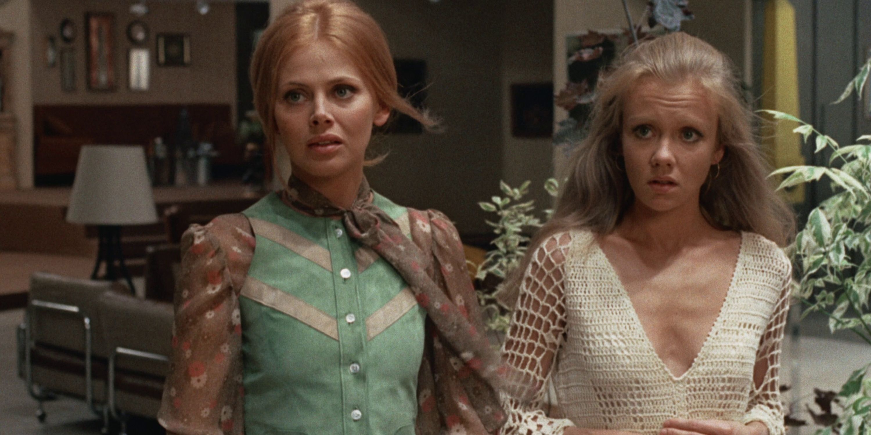 Britt Ekland and Hayley Mills both look worried as they stand outside in a garden in Endless Night (1972))