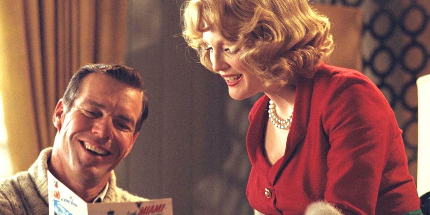 Dennis Quaid sitting next to Julianne Moore in Far from Heaven (2002)
