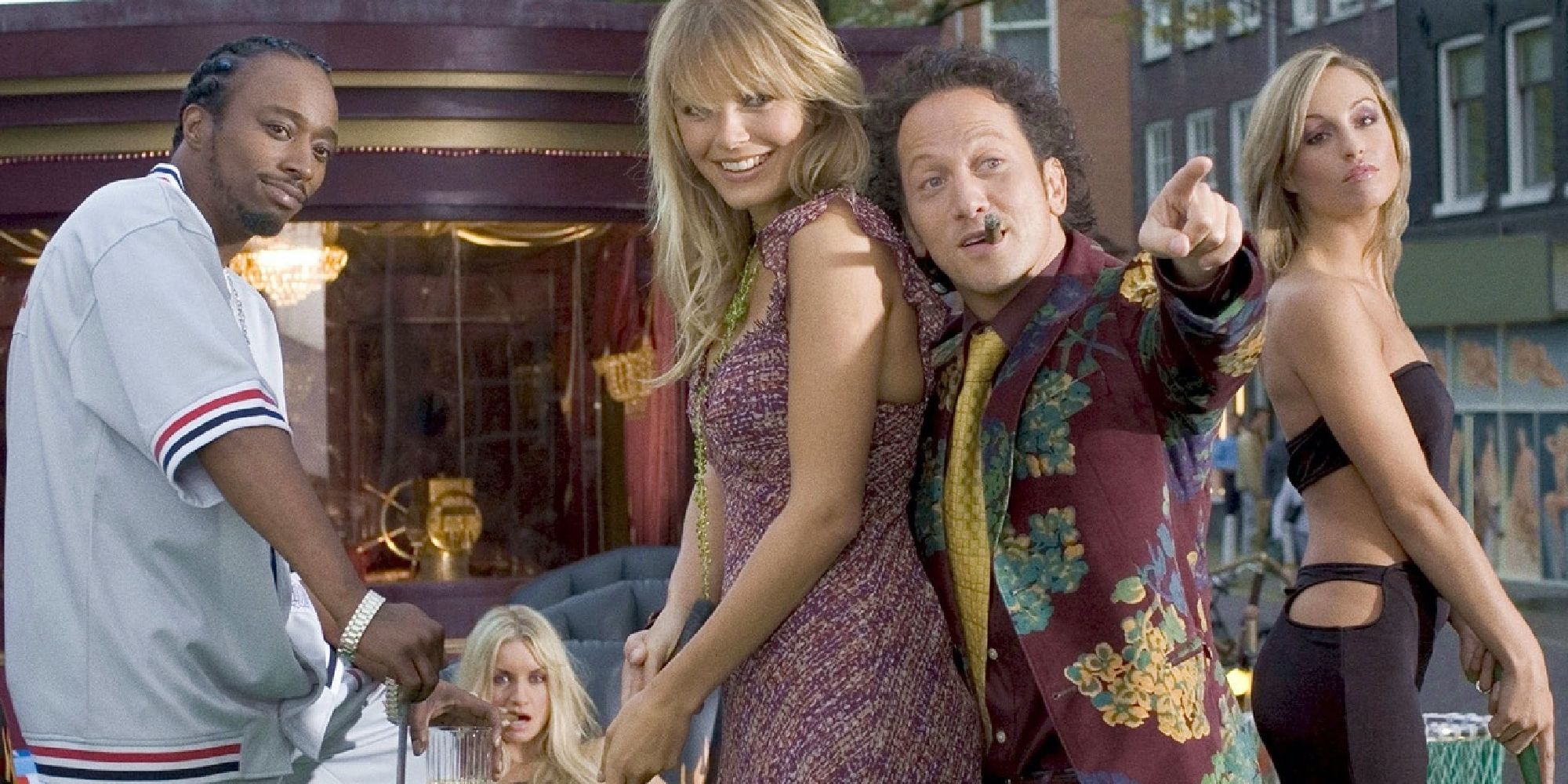 Rob Schneider as Deuce & Eddie Griffin as T.J. with a group of women in Deuce Bigalow: European Gigolo