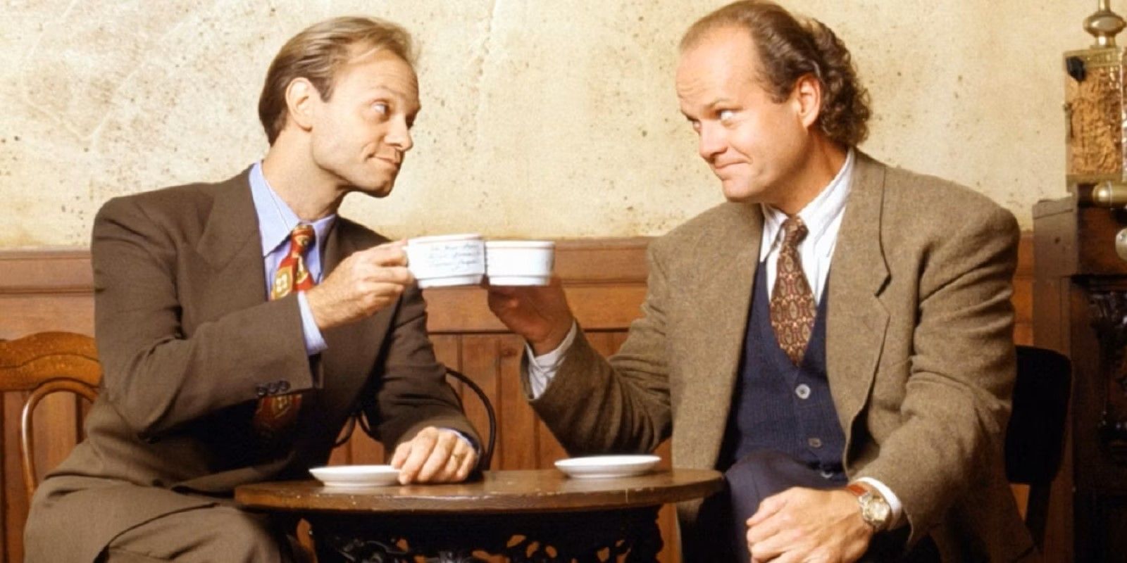 Frasier and Niles Crane sitting at a table