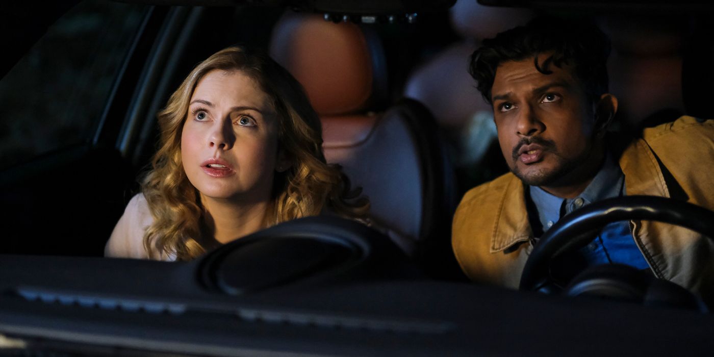 Sam (Rose McIver) and Jay (Utkarsh Ambudkar) watch one of the Woodstone ghosts ascend to Heaven