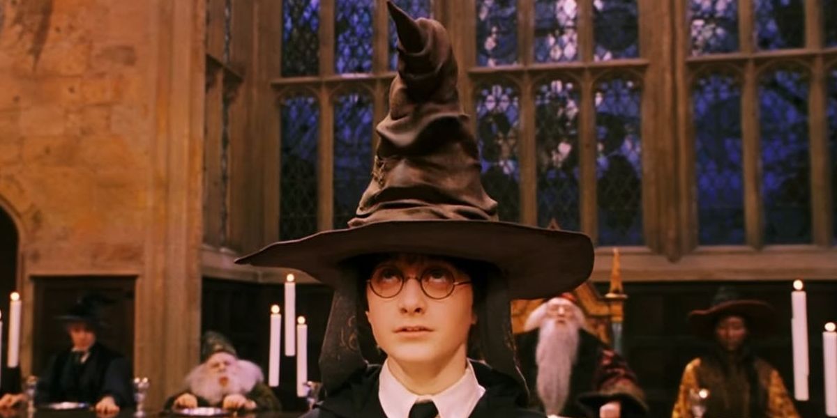 Harry (Daniel Radcliffe) wearing the sorting hat in Harry Potter and the Sorcerer's Stone