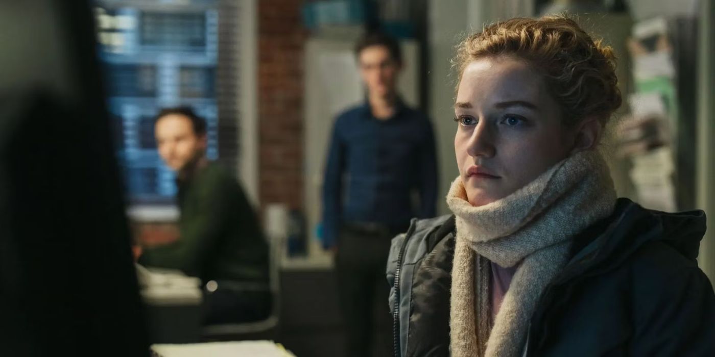 Jane (Julia Garner) sitting at a computer in an office in &lsquo;The Assistant&rsquo;.