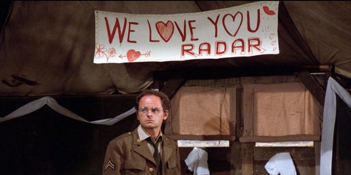 Gary Burghoff as Walter "Radar" O'Reilly, standing in front of a We Love You Radar banner in M*A*S*H 