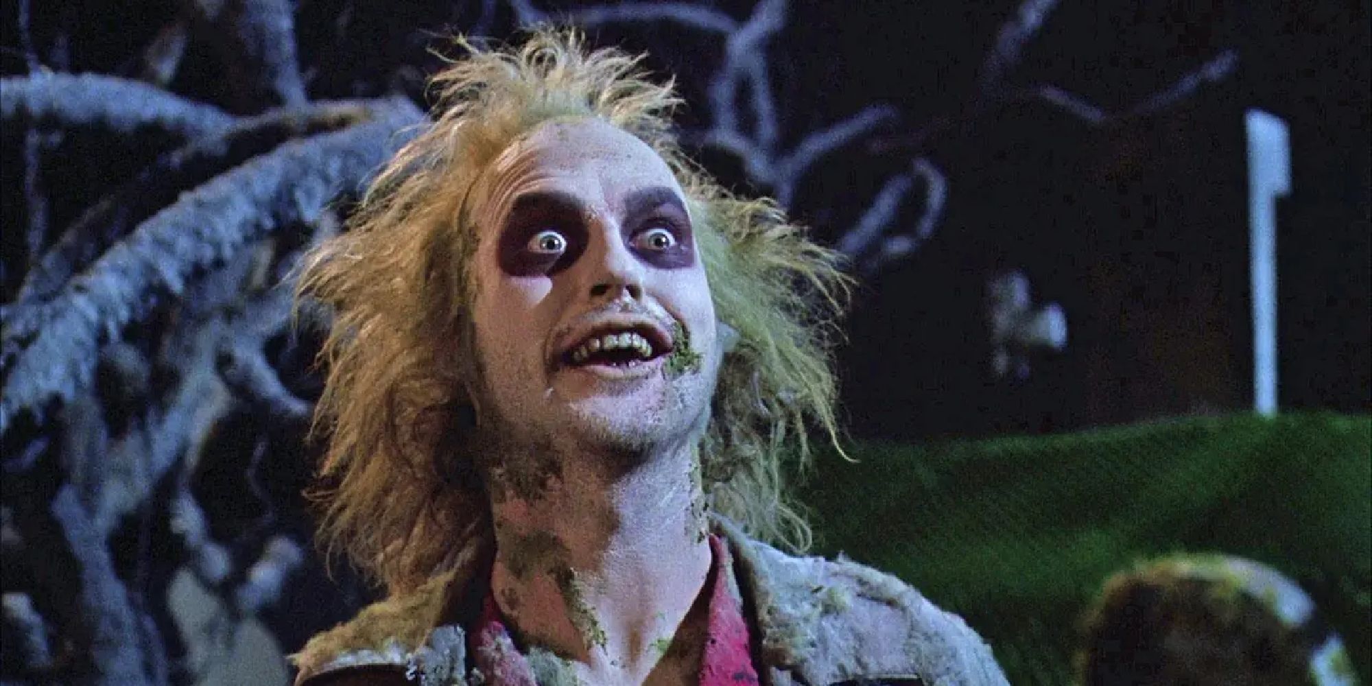 Michael Keaton smiles in Beetlejuice