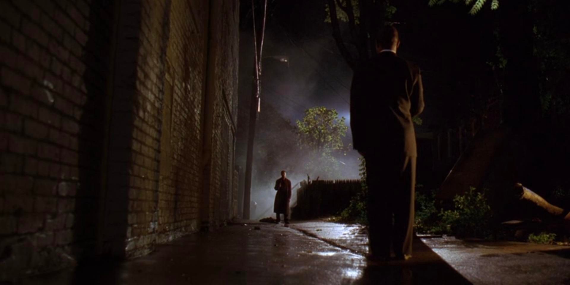 Omar (Michael K. Williams) is confronted in the street by New York hitman Brother Mouzone (Michael Potts)
