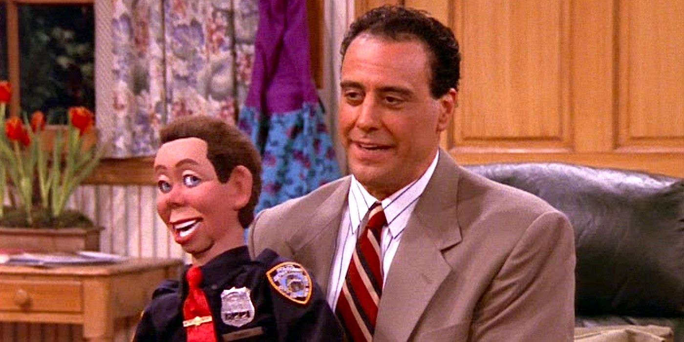 Robert Barone (Brad Garrett) with a ventriloquist's dummy on 'Everybody Loves Raymond'