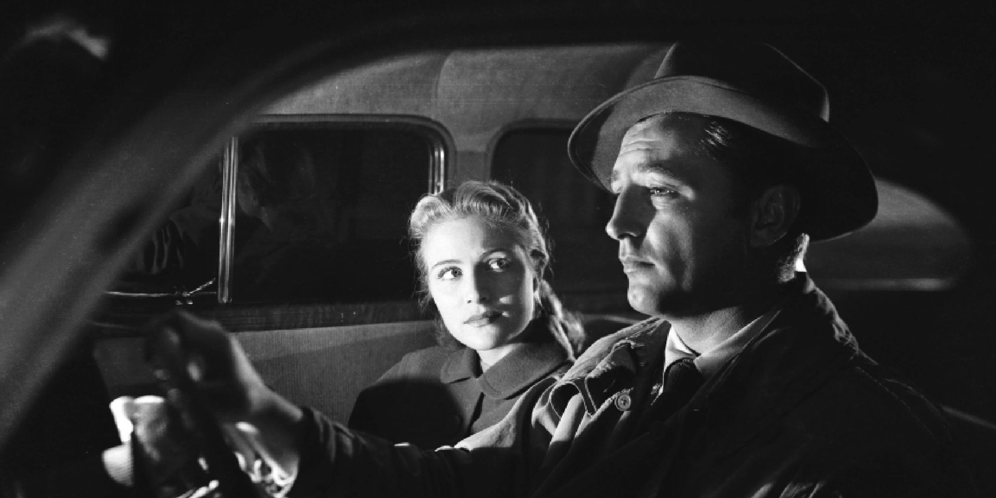 Robert Mitchum e Jane Greer em Fora do Passado