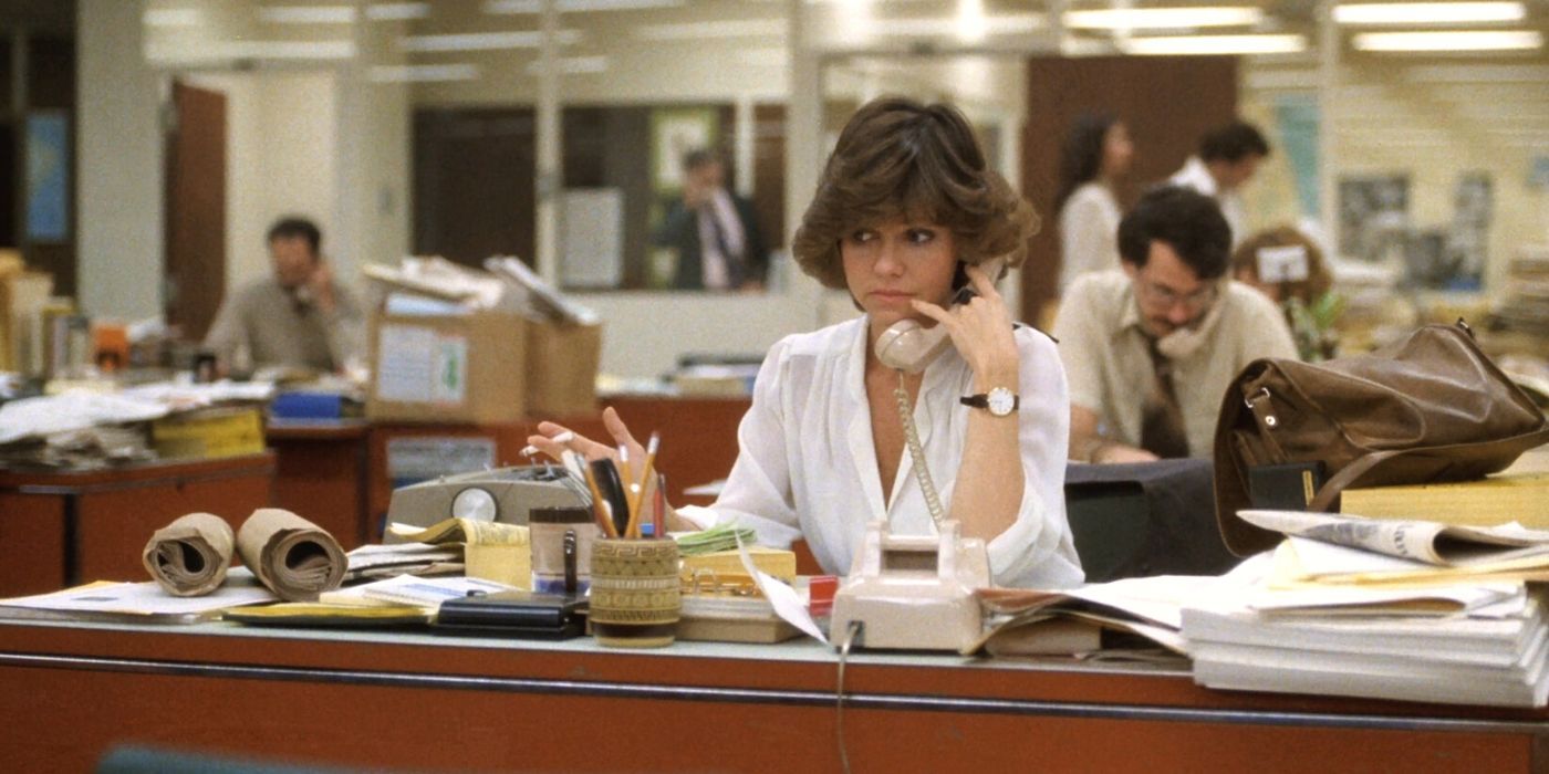 Sally Field sitting at a desk on the phone in Absence of Malice (1981)