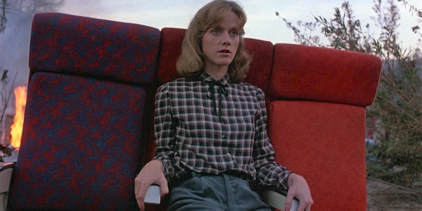 Anita Skinner as Denise Watson sitting the remnants of a plane crash in Sole Survivor