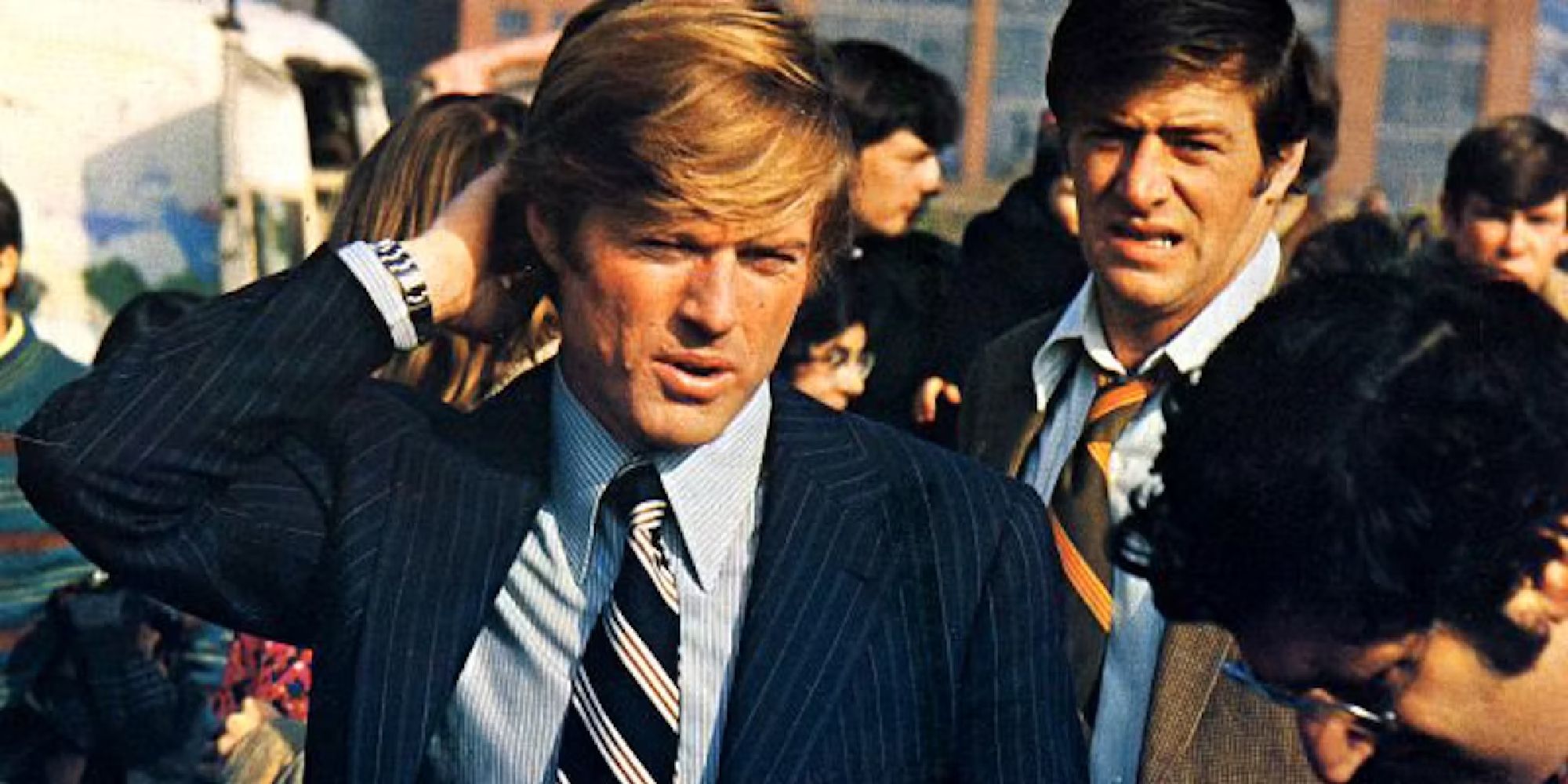 Robert Redford as Bill McKay looking confused and scratching the back of his head in The Candidate (1972)