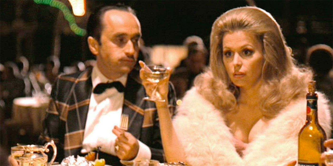 Marianna Hill as Deanne Dunn, sitting with John Cazale's Fredo in The Godfather