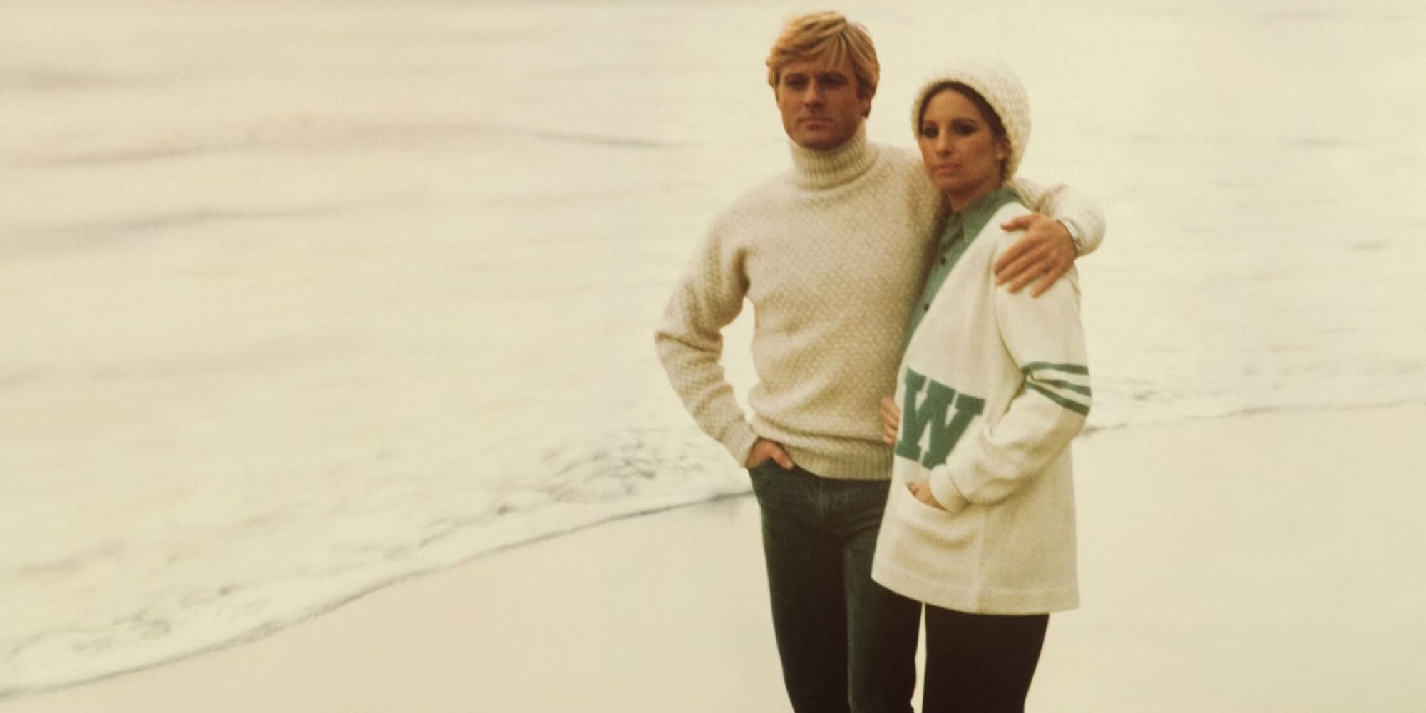 Hubbell and Katie embracing at the beach in The Way We Were - 1973