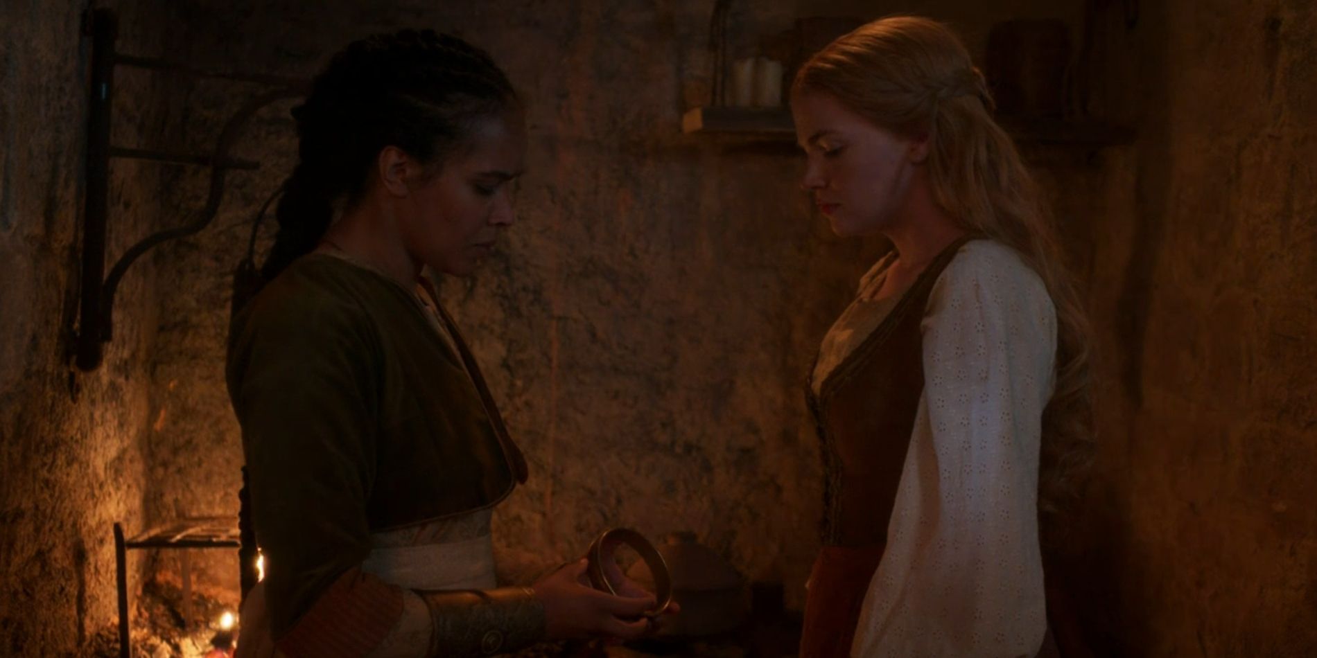 Nynaeve (Zoë Robins) and Elayne (Ceara Coveney) plan to save their friend