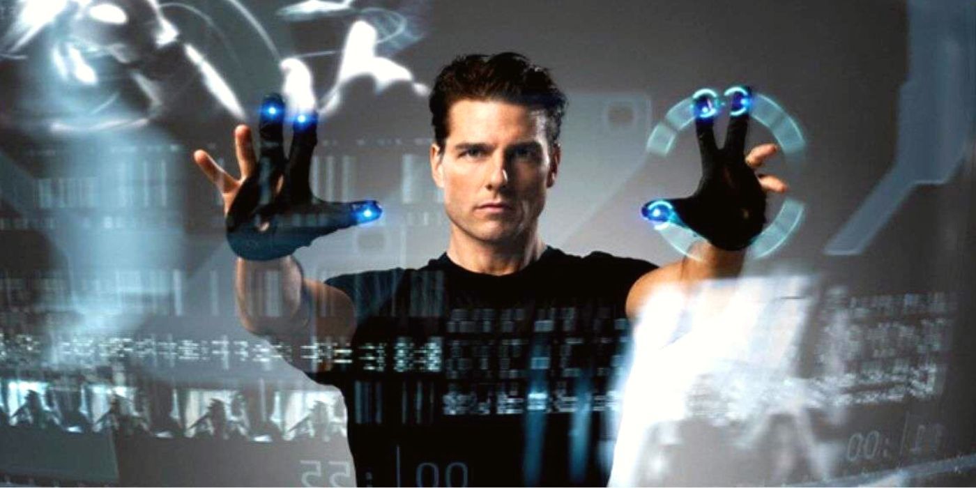 Tom Cruise standing in front of a screen in Minority Report (2002)