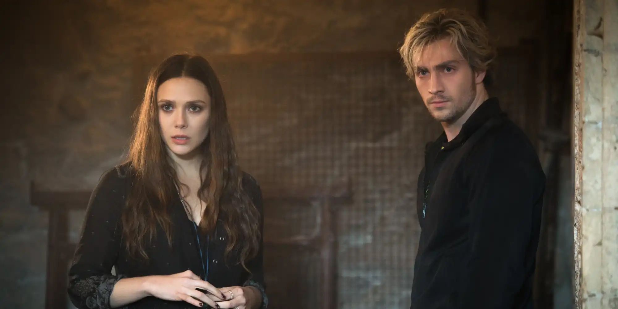Wanda and Pietro Maximoff looking intently in the same direction in Avengers: Age of Ultron
