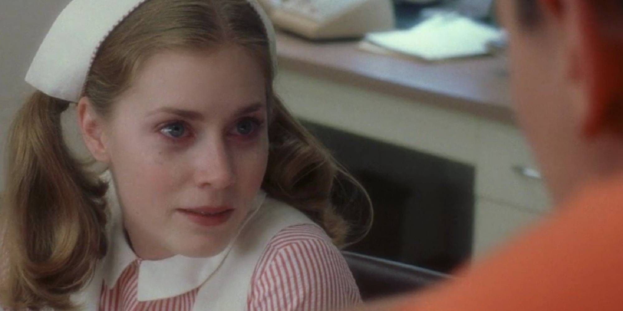 A close-up shot of a young Amy Adams in Catch Me If You Can.