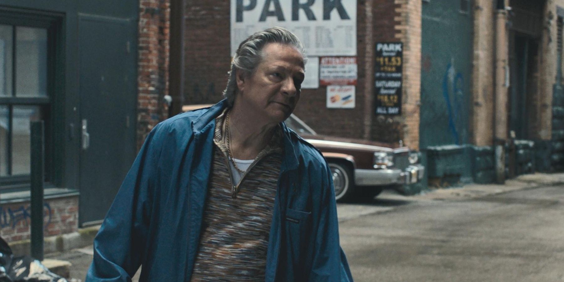 Chris Cooper as Jerry Vogel walking down the street in A Beautiful Day in the Neighborhood