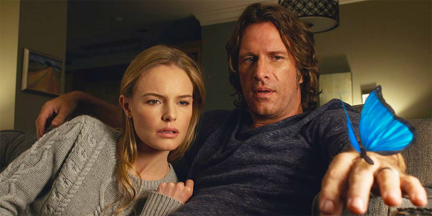 Kate Bosworth and Thomas Jane as Jessie and Mark Hobson, looking at a blue butterfly on Mark's hand in Before I Wake