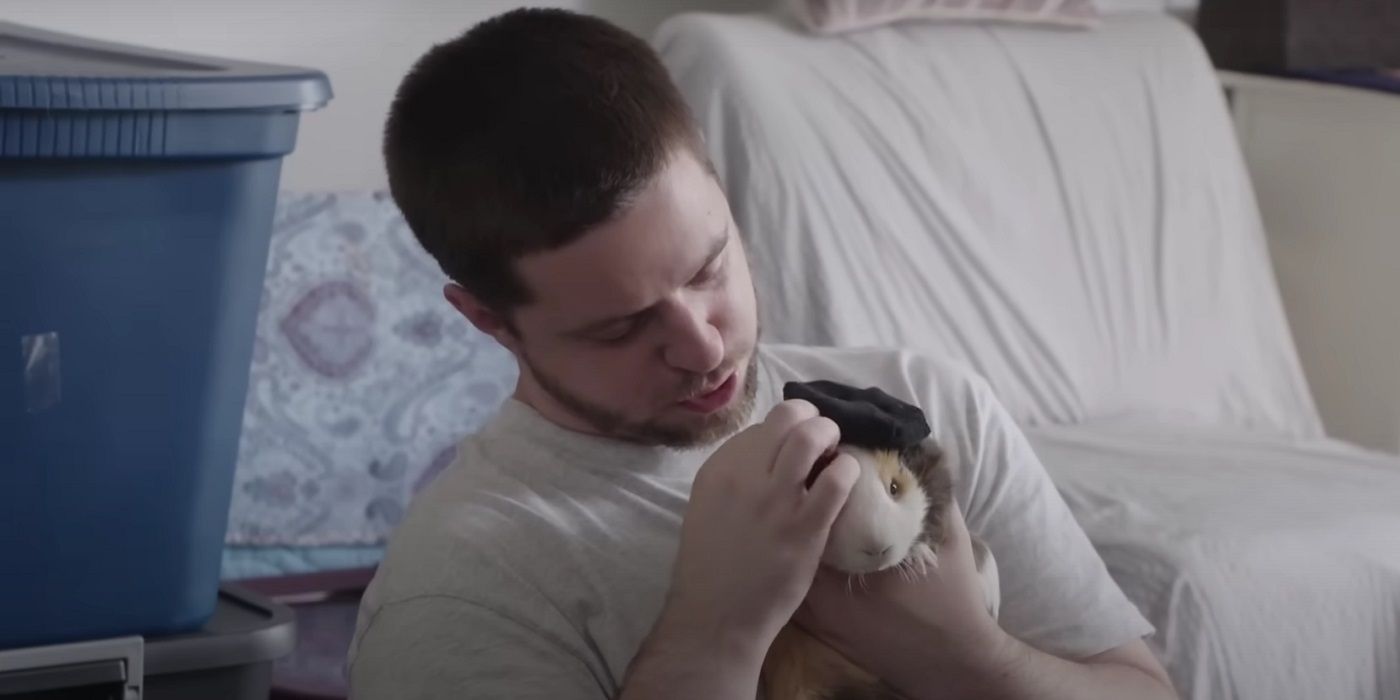 Clayton petting his guinea pig in 90 Day Fiance Season 10
