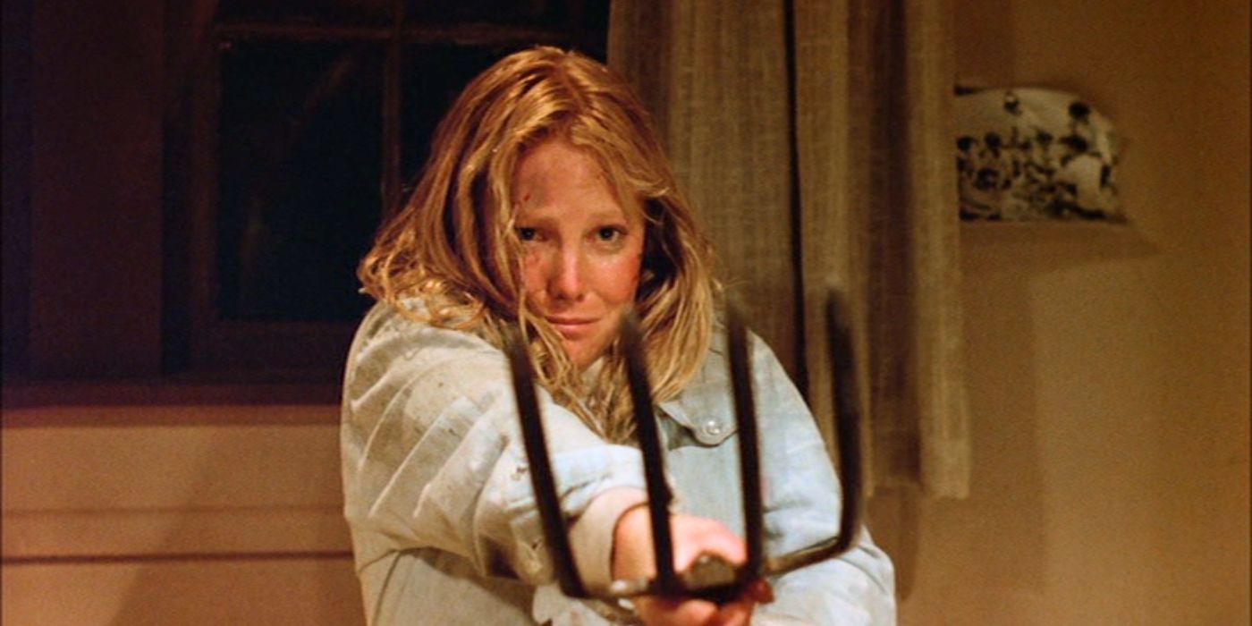 Friday the 13th Part 2's Final Girl, Ginny Field (Amy Steel) holding up a pitchfork