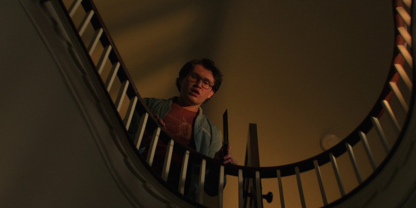 Corey Cunningham (Rohan Campbell) at the top of the stairs in 'Halloween Ends'