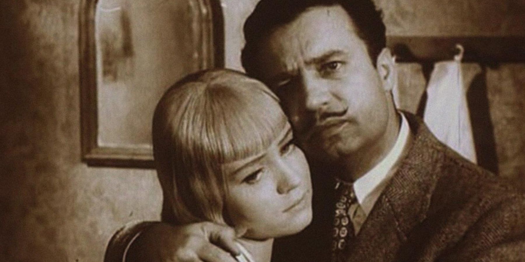 Black and white still image of Vladimir Mensik and Jaroslava Obermalerova hugging in Happy End