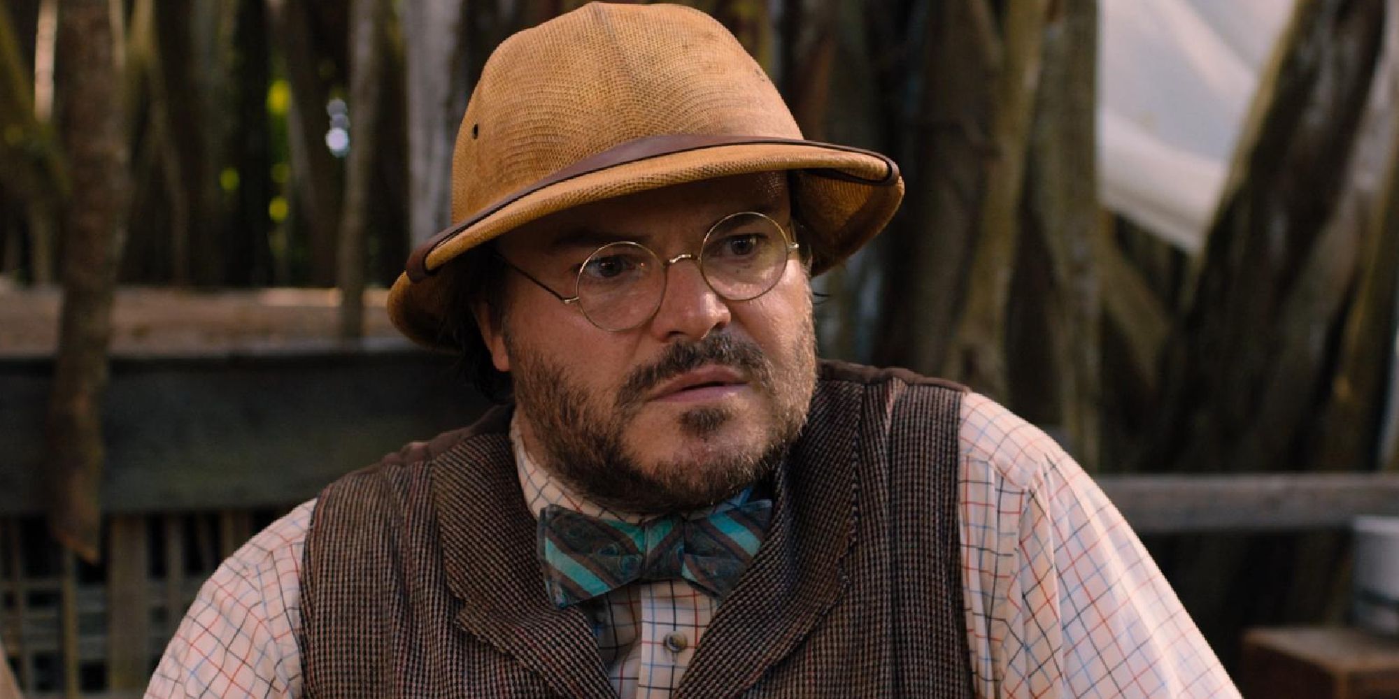 Jack Black as Professor Sheldon "Shelly" Oberon looking somber in Jumanji: Welcome to the Jungle