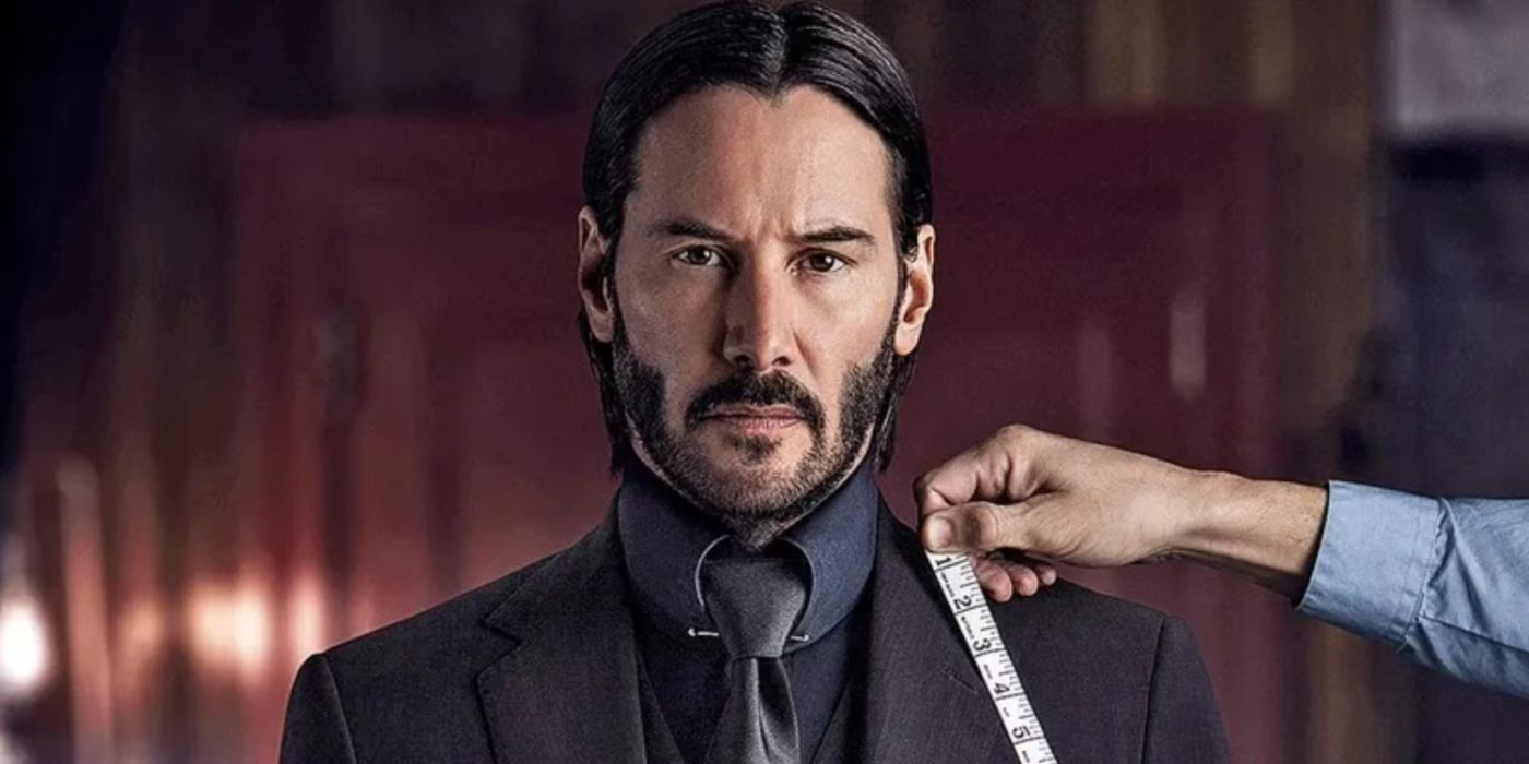 Keanu Reeves as John Wick getting his suit tailored in 'John Wick: Chapter 2'