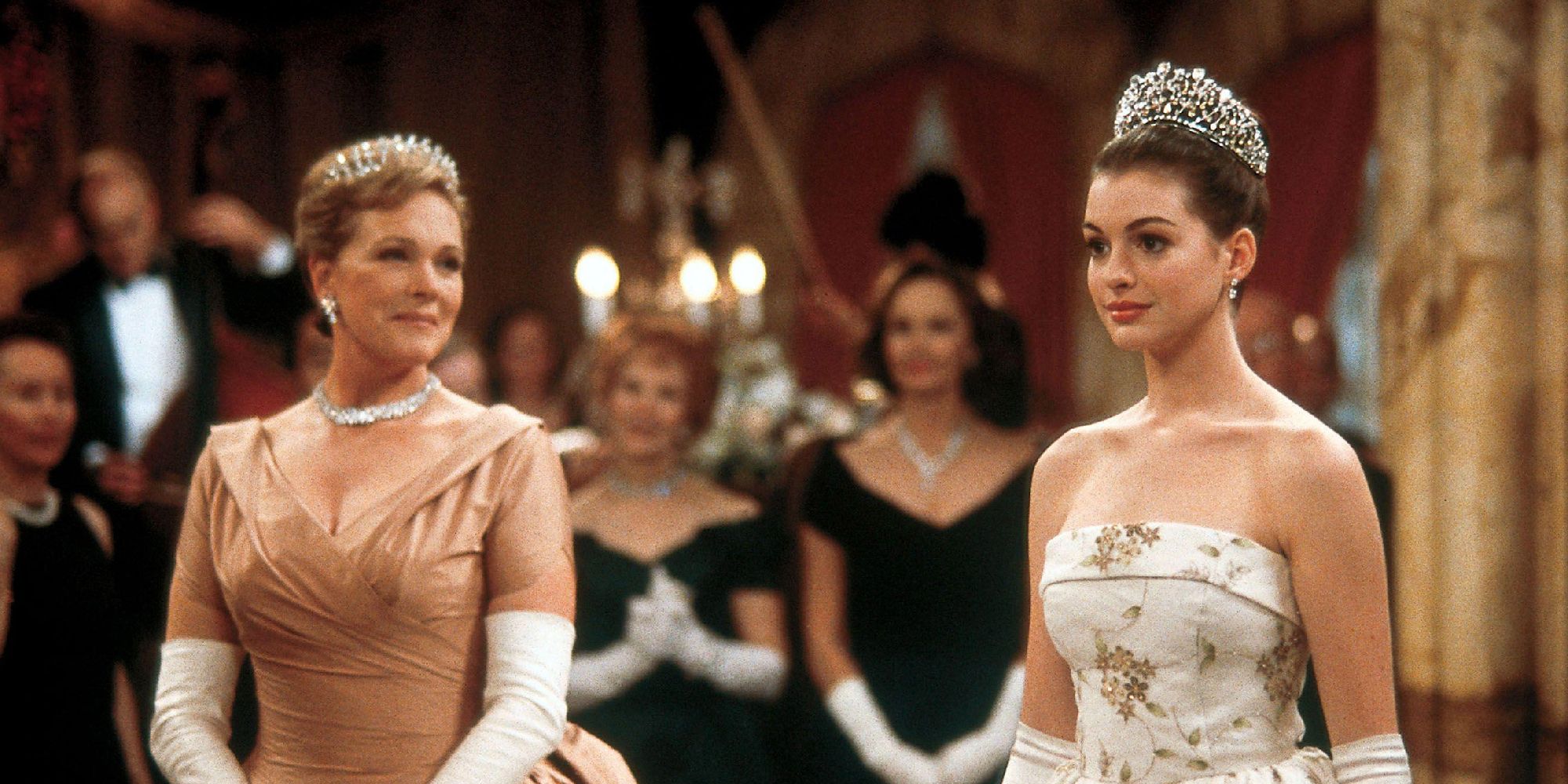 Julie Andrews smiling and looking at Anne Hathaway in The Princess Diaries.