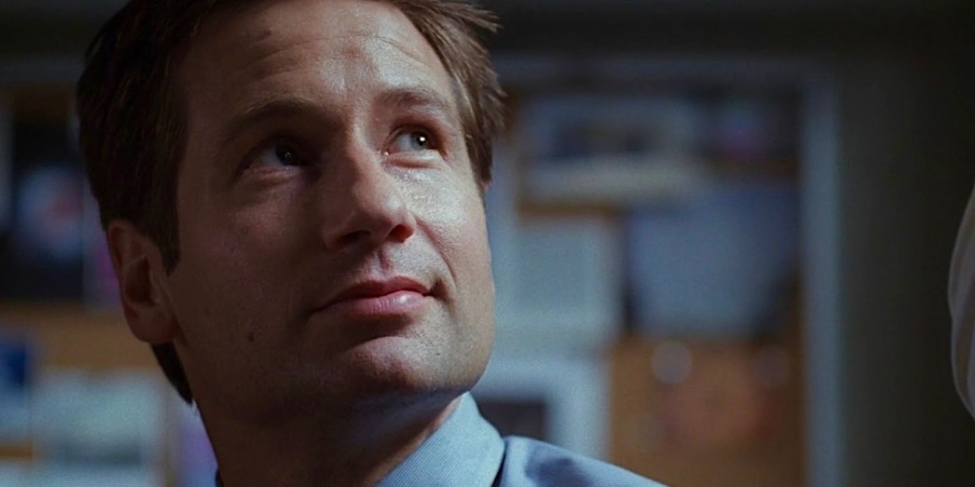 Agent Mulder from the series The X-Files looks to the sky