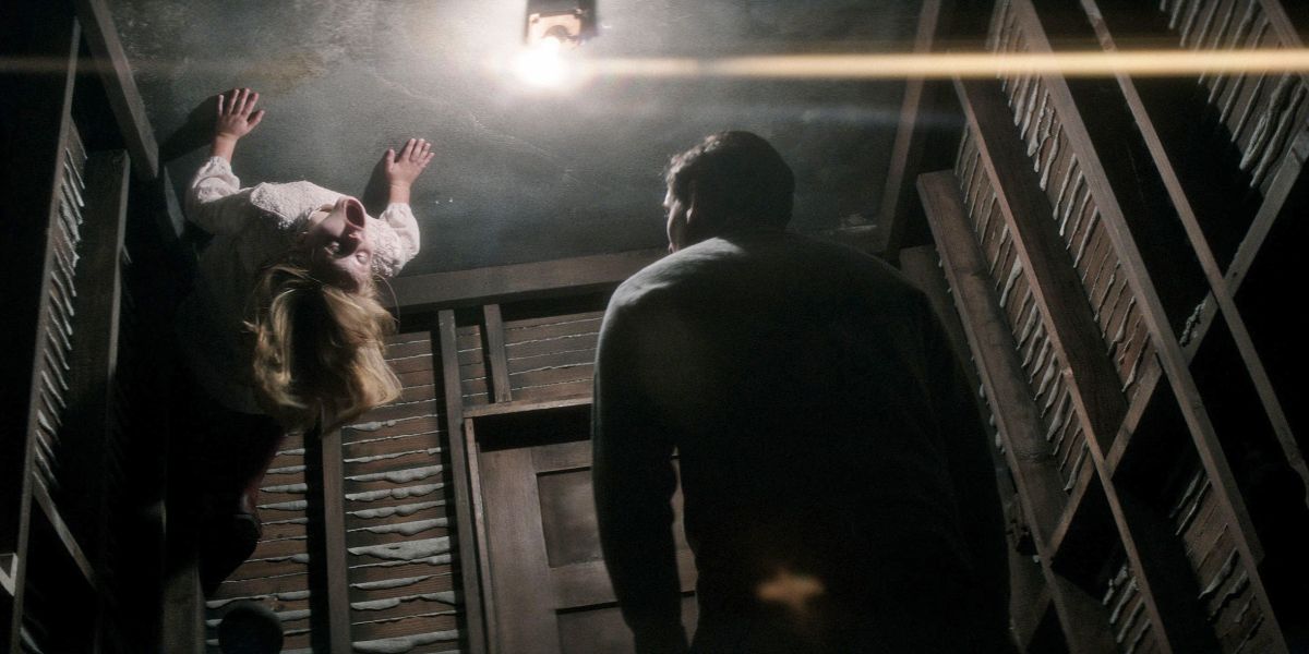 A possessed Doris on the ceiling in Mike Flanagan's Ouija: Origin of Evil