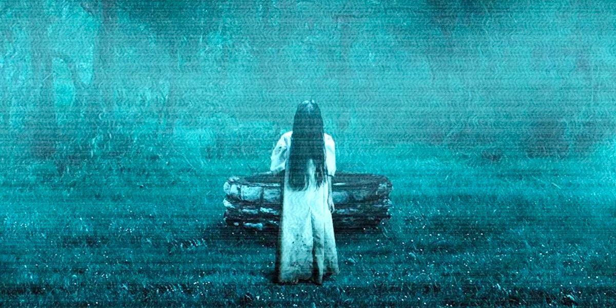 Daveigh Chase as Samara emerges from a well and walks towards the camera in 'The Ring' (2002)