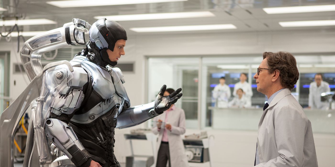Alex Murphy inspecting his new robotic form in a lab in 2014 RoboCop