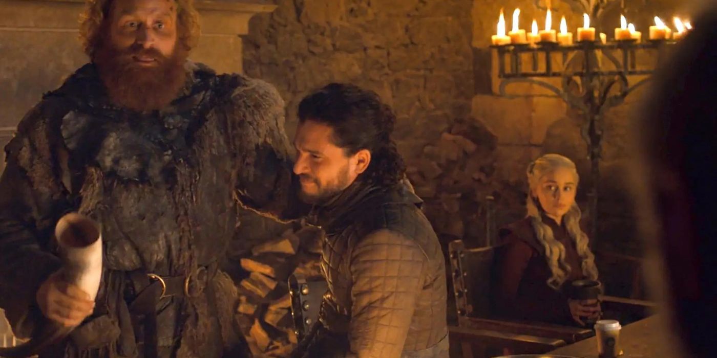 Daenerys (Emilia Clarke) sitting in front of a Starbucks cup in a scene from Game of Thrones