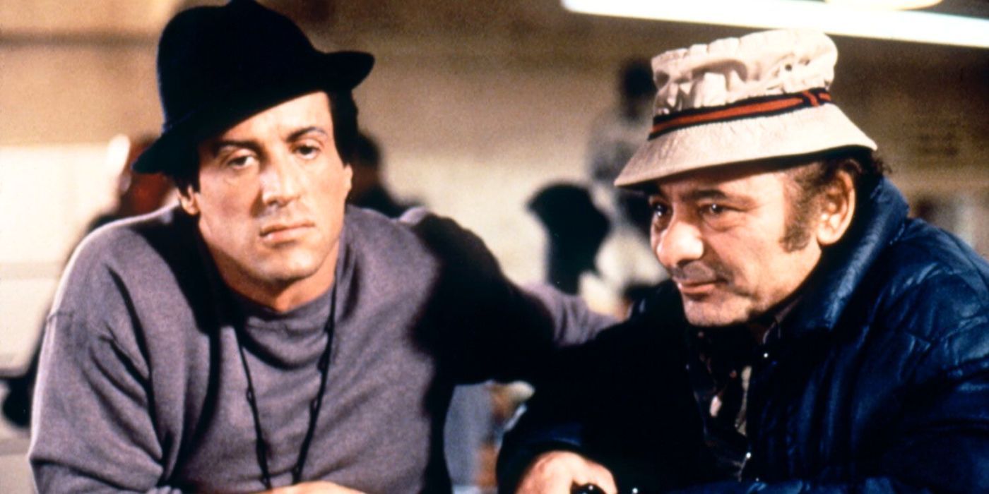 Sylvester Stallone standing next to Burt Young in Rocky (1976)