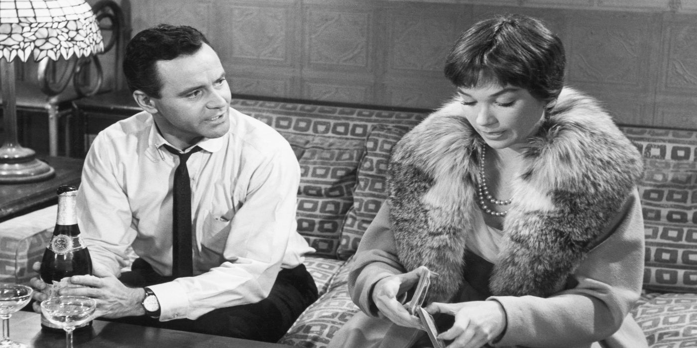 Jack Lemmon and Shirley MacLaine talking on a couch in 'The Apartment'