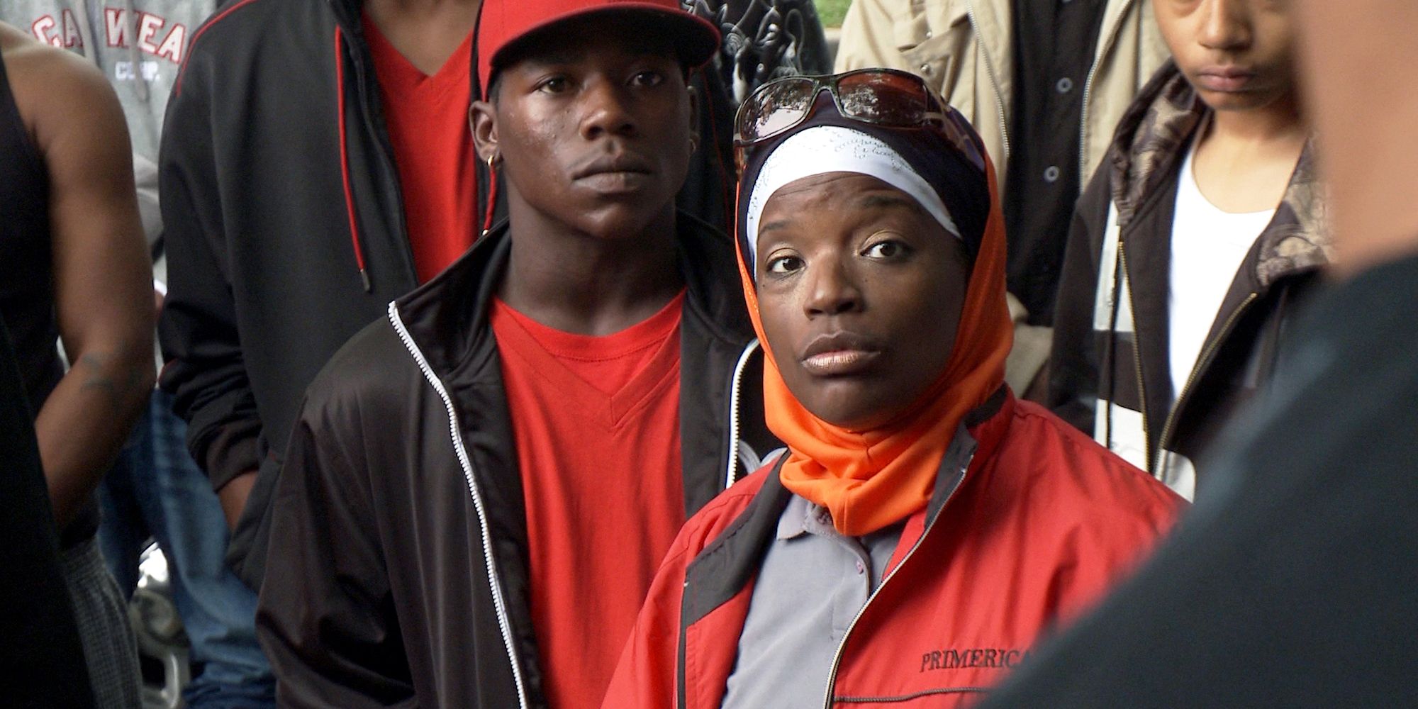 A man and a woman looking at someone in the documentary The interrupters 20110