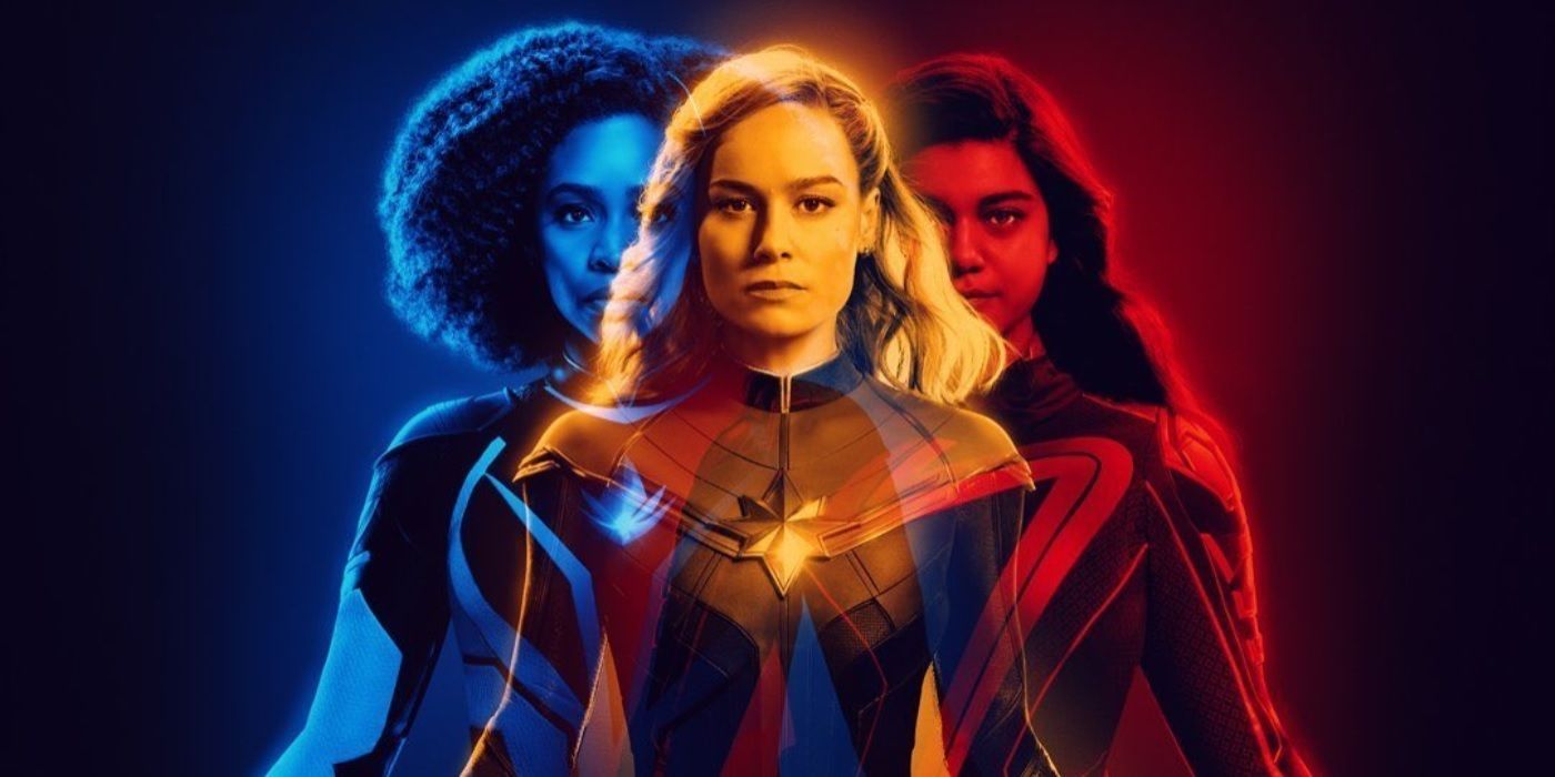 Teyonah Parris, Brie Larson, and Iman Vellani standing side by side in their super suits on a cropped version of Real D 3D's poster for The Marvels