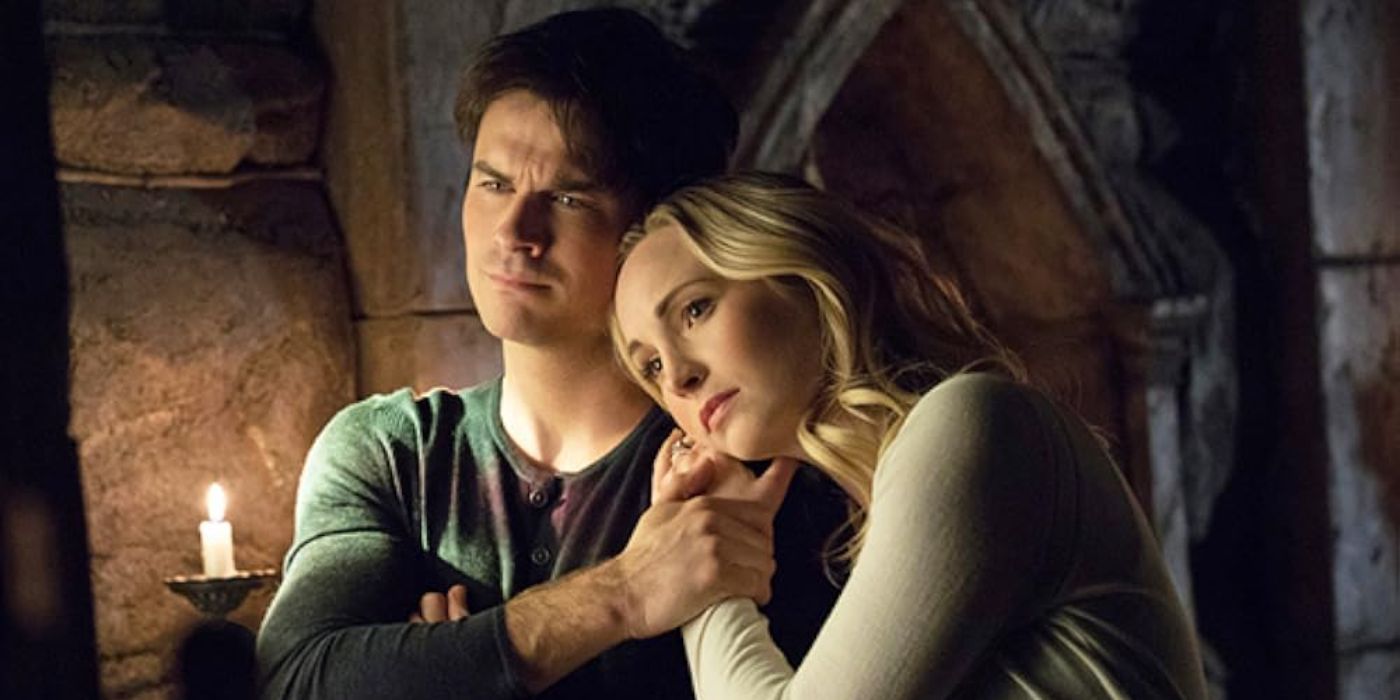 Damon, played by Ian Somerhalder, holding Caroline, played by Candice King, in 'The Vampire Diaries.'