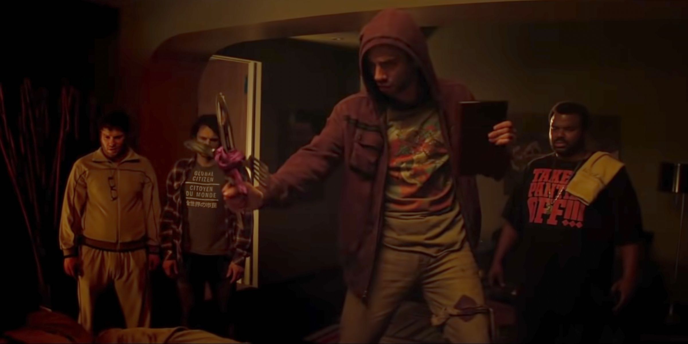 Jay Baruchel performs and exorcism on Jonah Hill in 'This is the End'
