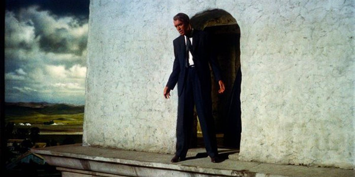 John Ferguson (James Stewart) standing on a ledge in Vertigo (1958)