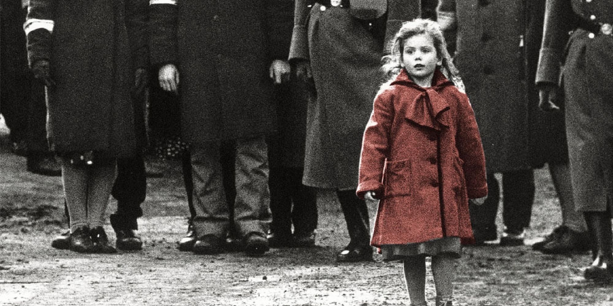 A little girl in a red coat walking alone in Schindler's List