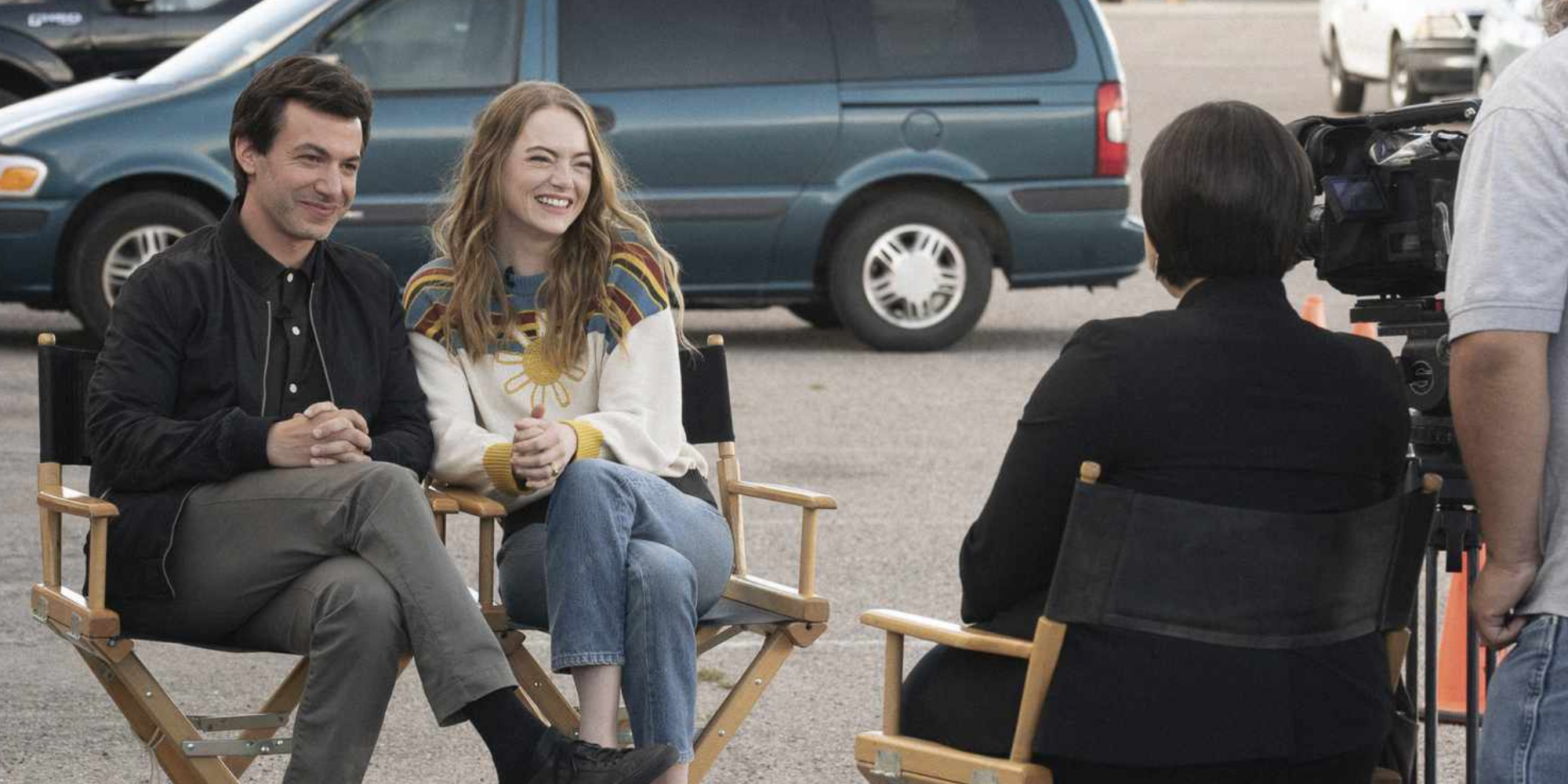 Asher and Whitney smiling during an interview in The Curse.