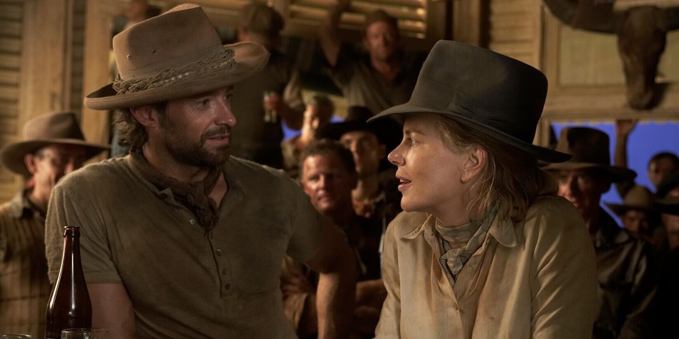 Lady Sarah Ashley (Nicole Kidman) et The Drover (Hugh Jackman) discutent dans un bar de Faraway Downs