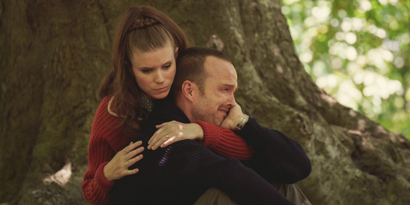Aaron Paul crying while Kate Mara holds him in Black Mirror&rsquo;s Beyond the Sea