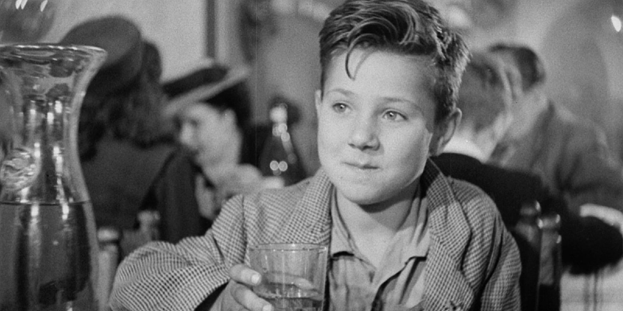 A young boy smiling in Bicycle Thieves - 1948 (2)